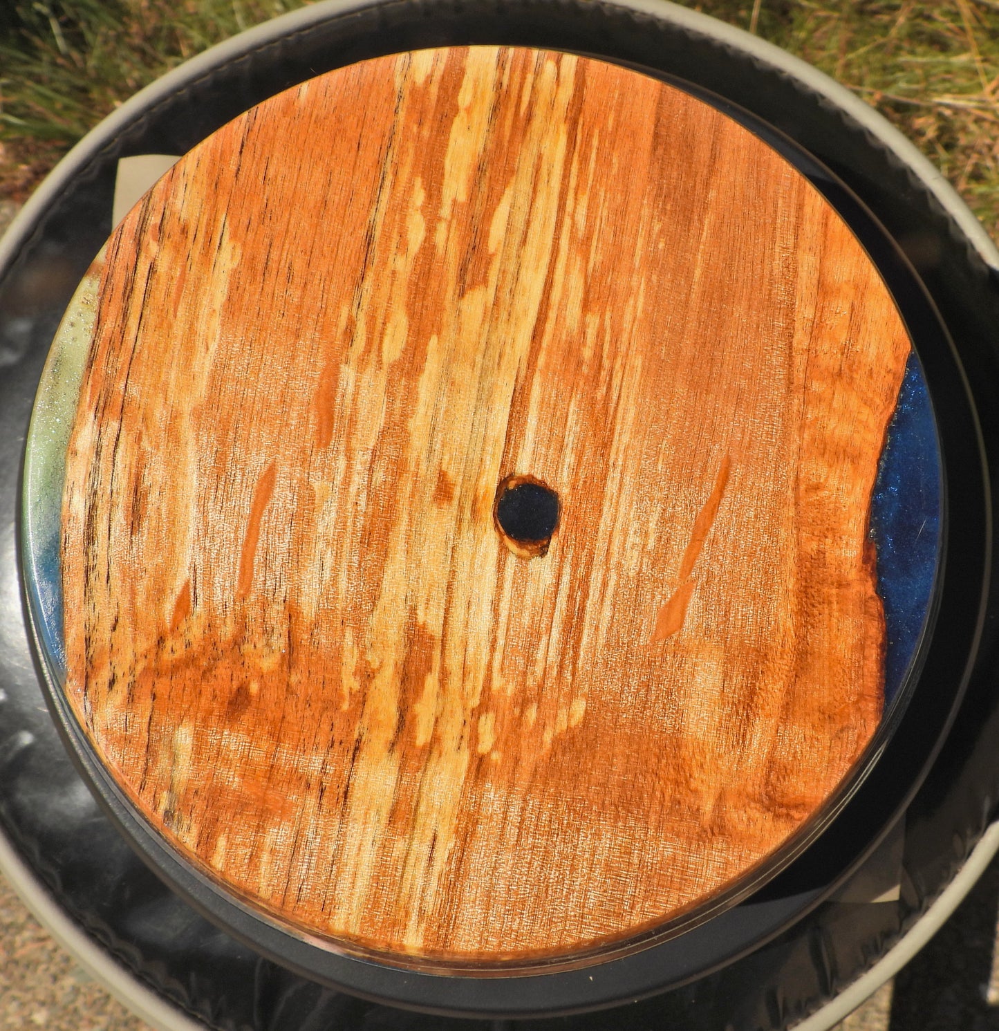 Bottom of Wood and epoxy resin bowl in Seahawks football blue and green colors