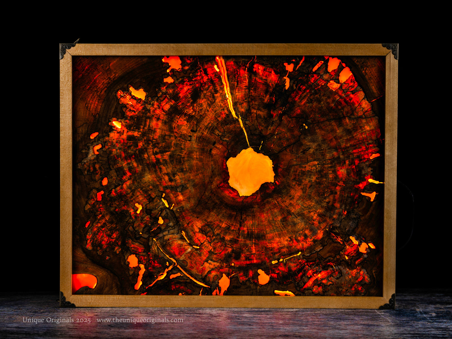 A colorful and vibrant 16x20 wood and epoxy resin interactive art piece backlit with LED lights.  Made with hardwoods and featuring brass accents.